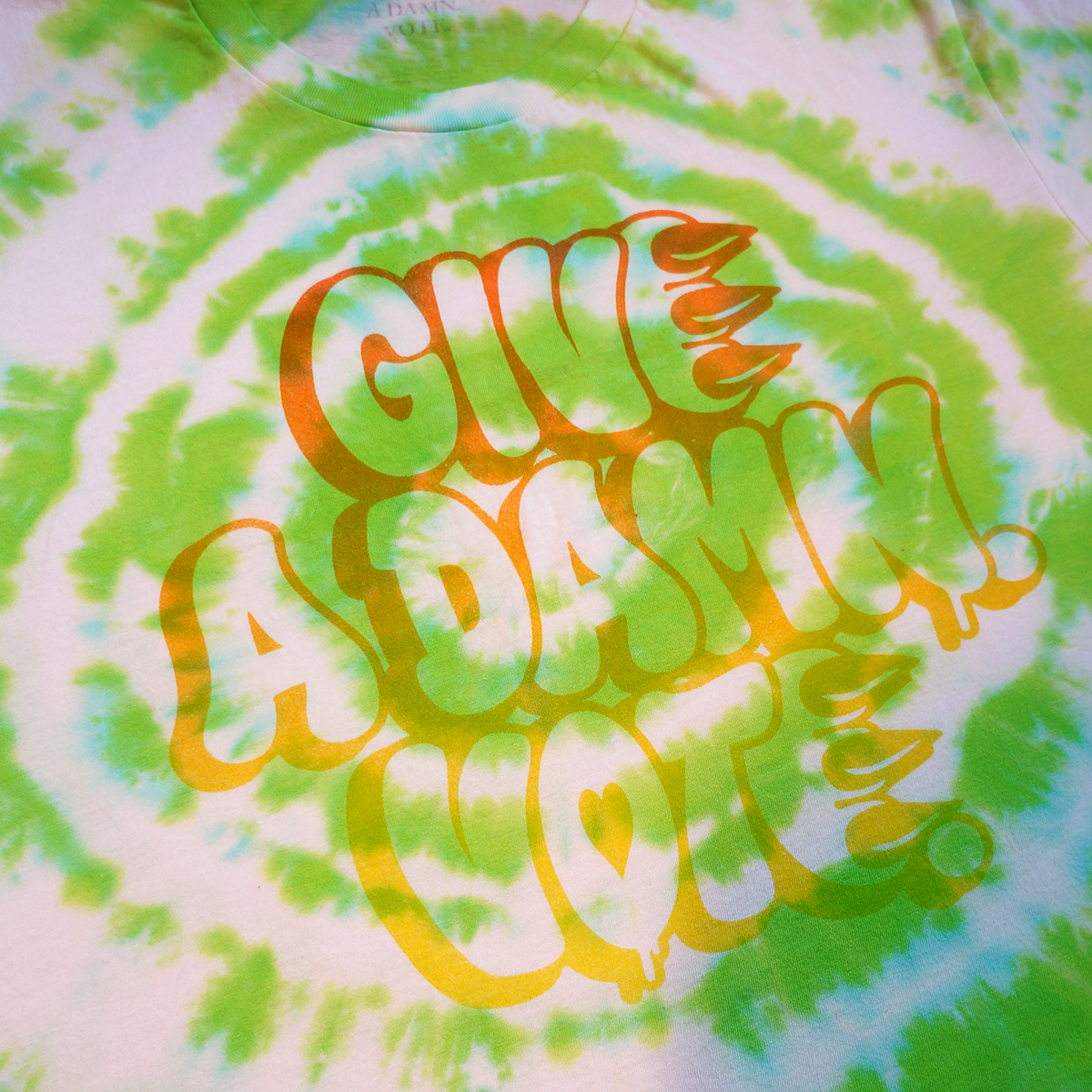 GIVE A DAMN VOTE X CLAW GREEN & ORANGE TIE DYE TEE
