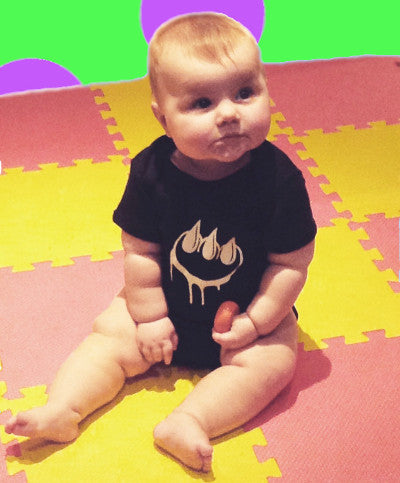 Claw pink on pink onesie